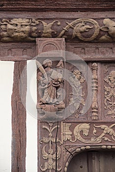 Carving detail of an old half-timbered house photo